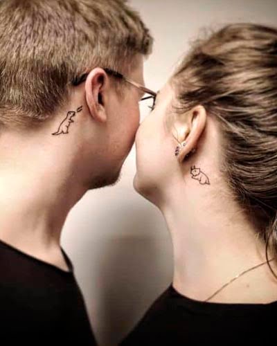 Tatuagens para casal de dinossauro atrás da orelha